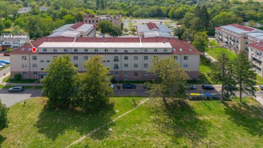 Prodej  podkrovního bytu 3+kk s parkovacím stání v Milovicích (okr. Nymburk)