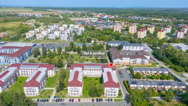 Prodej  podkrovního bytu 3+kk s parkovacím stání v Milovicích (okr. Nymburk)
